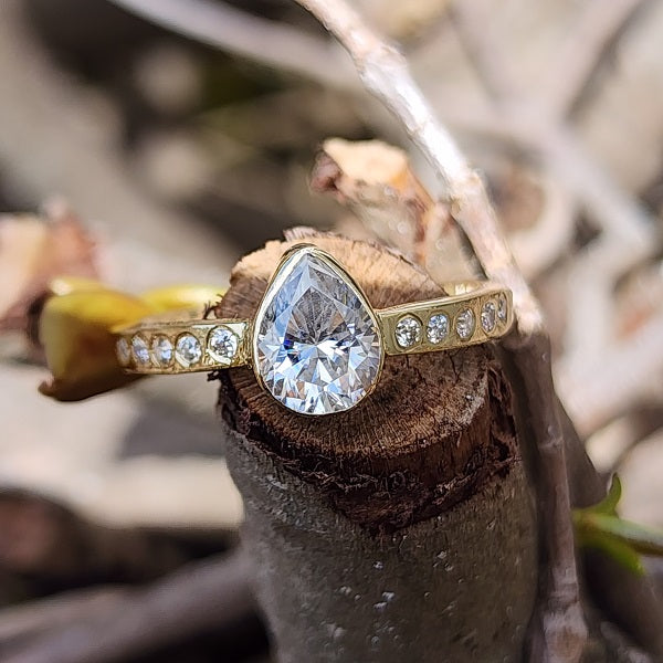 Pear Moissanite Accented Gold Ring