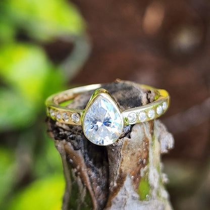 Pear Moissanite Accented Gold Ring