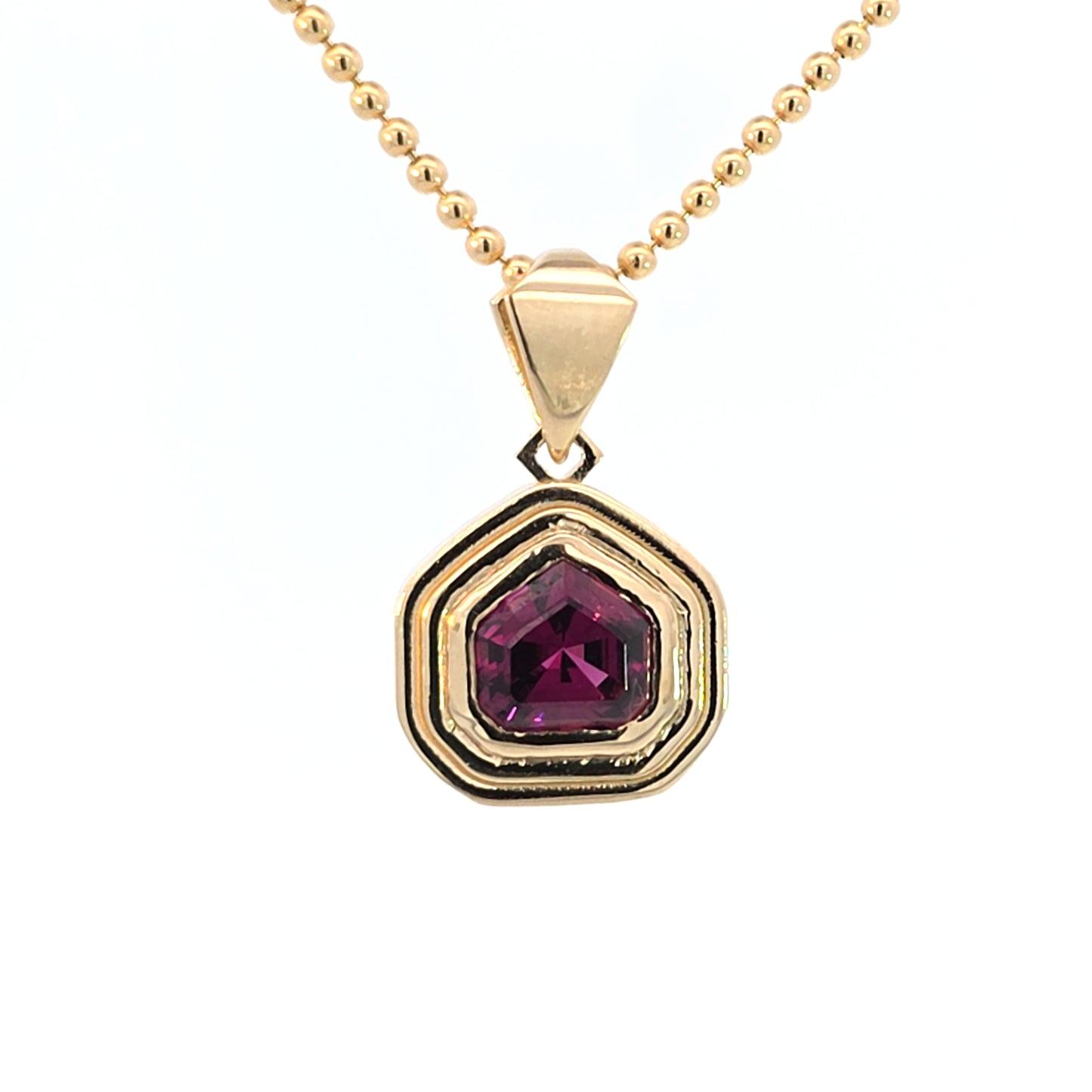 Garnet Shield Ripple Pendant