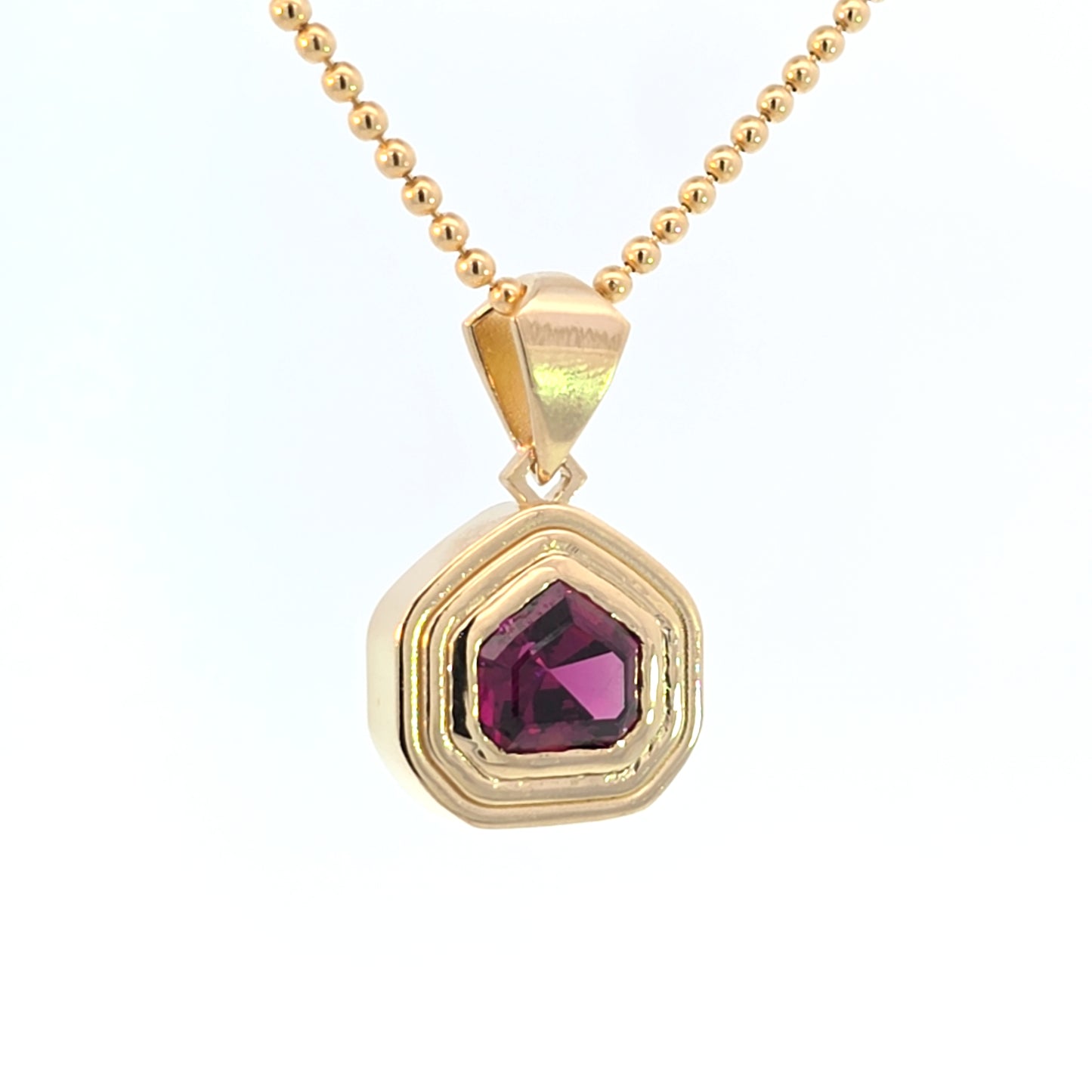 Garnet Shield Ripple Pendant