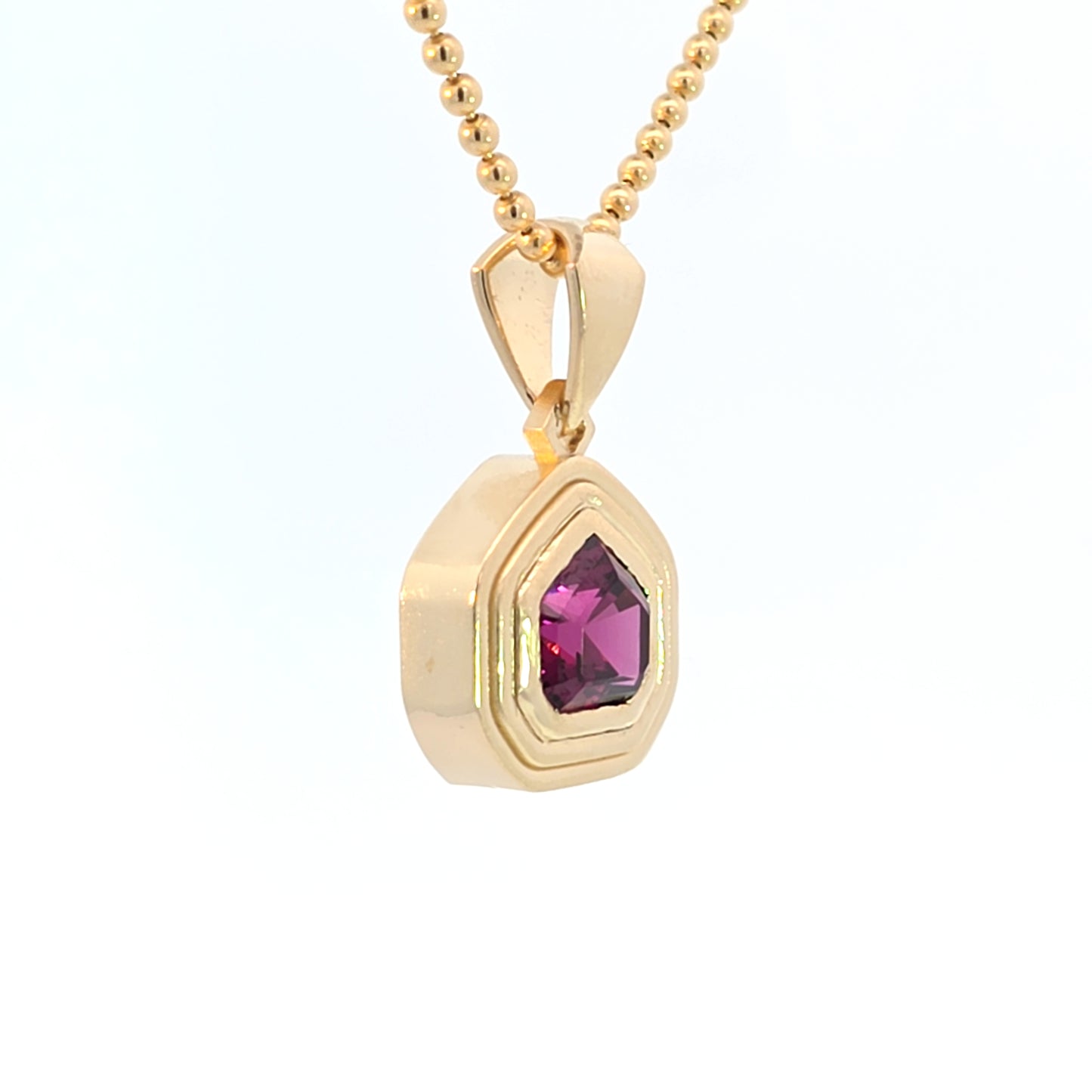 Garnet Shield Ripple Pendant